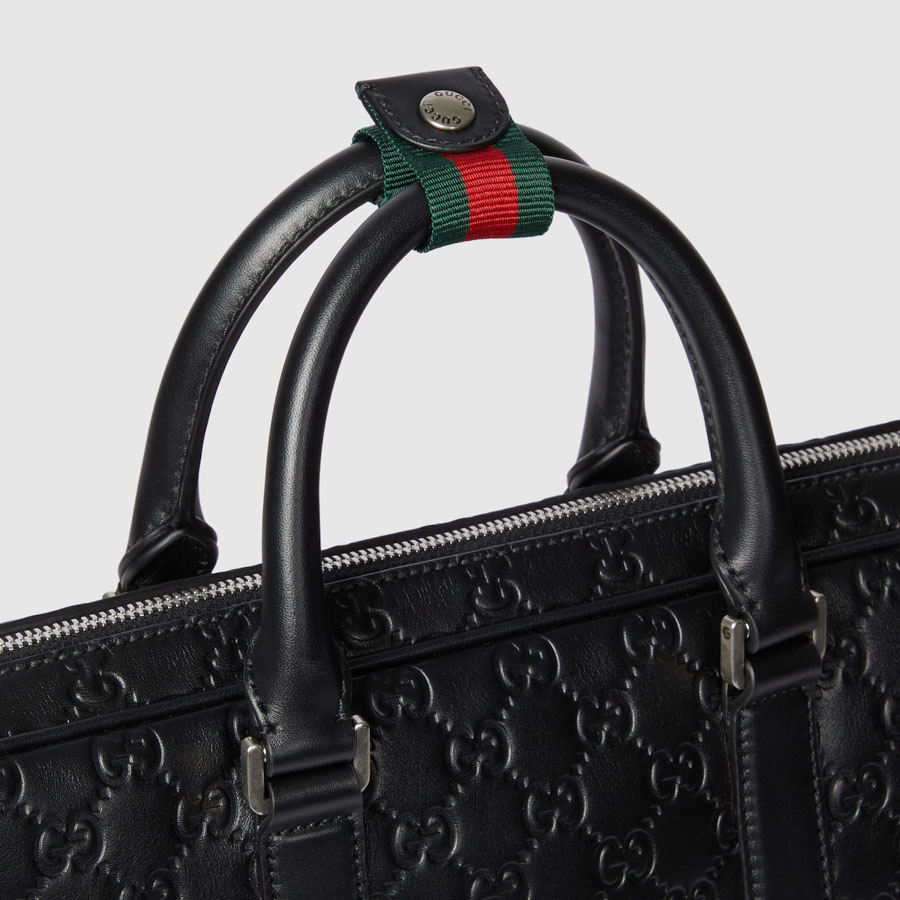 Cặp công sở Gucci màu đen da mềm dập nổi hoạ tiết GG Supreme chính hãng TGG50 2026 Cặp công sở Gucci màu đen da mềm dập nổi hoạ tiết GG Supreme chính hãng TGG50 2026