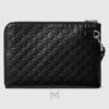 Túi cầm tay Gucci da màu đen hoạ tiết monogram dập nổi hàng hiệu TGG47 2026 Túi cầm tay Gucci da màu đen hoạ tiết monogram dập nổi hàng hiệu TGG47 2026
