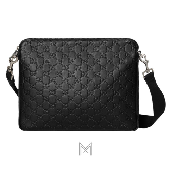Túi đeo chéo Gucci Emblem màu đen dập nổi hoạ tiết monogram TGG51