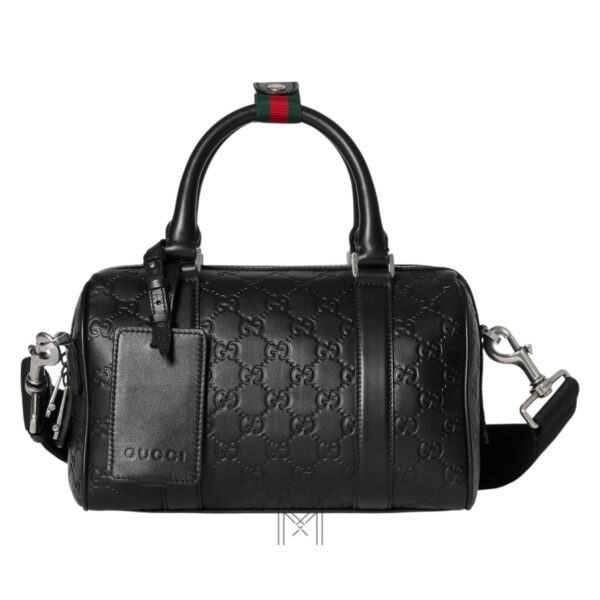 Túi xách đeo chéo Gucci Emblem small duffle màu đen hoạ tiết dập nổi TGG45