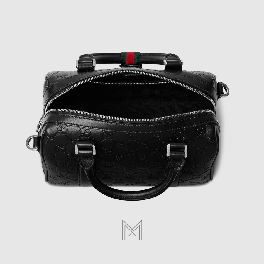 Túi xách đeo chéo Gucci Emblem small duffle màu đen hoạ tiết dập nổi TGG45 2026 Túi xách đeo chéo Gucci Emblem small duffle màu đen hoạ tiết dập nổi TGG45 2026