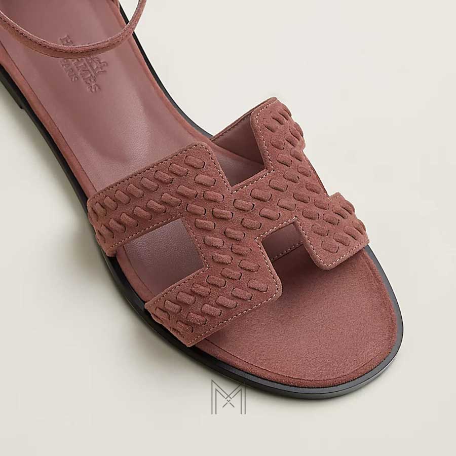 Dép quai hậu Hermes Santorini chính hãng màu hồng phấn da lộn MHHH038 2026 Dép quai hậu Hermes Santorini chính hãng màu hồng phấn da lộn MHHH038 2026