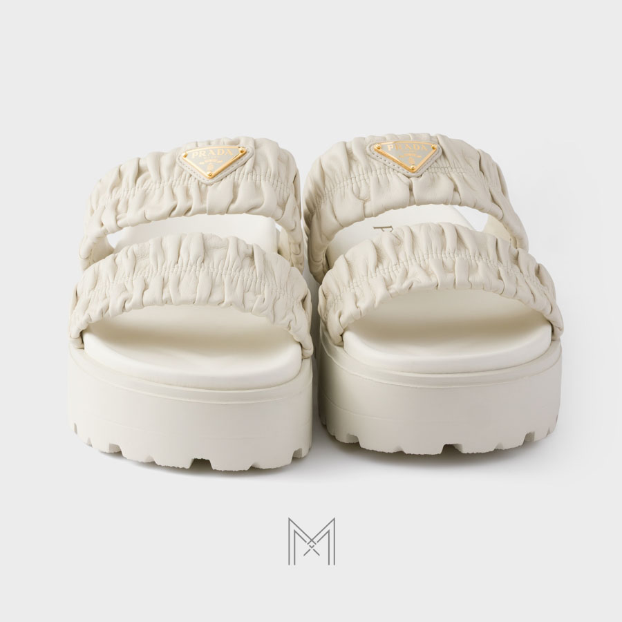 Dép quai ngang Prada Matelassé Nappa Leather Flatform màu trắng chính hãng MHHP019 2026 Dép quai ngang Prada Matelassé Nappa Leather Flatform màu trắng chính hãng MHHP019 2026