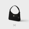 Túi Prada Ngọc Trinh màu đen khoá bạc authentic PRD02 2026 Túi Prada Ngọc Trinh màu đen khoá bạc authentic PRD02 2026