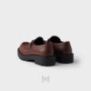 Giày loafer Prada màu nâu logo bạc chính hãng MHNP080 2026 Giày loafer Prada màu nâu logo bạc chính hãng MHNP080 2026