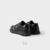 Giày thể thao Prada Prax 01 Re-Nylon and Brushed Leather màu đen authentic MHNP055 2026 Giày thể thao Prada Prax 01 Re-Nylon and Brushed Leather màu đen authentic MHNP055 2026