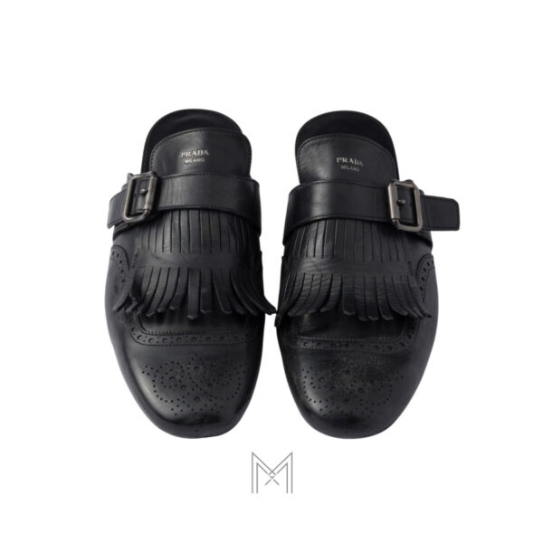 Giày sục Prada Shuffle Antiqued Leather màu đen tua rua chính hãng MHNP078