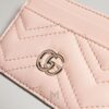 Ví da đựng thẻ Gucci màu hồng logo GG kim loại màu vàng authentic MVG88 2026