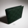 Ví gập đôi Gucci màu xanh hoạ tiết canvas monogram hàng hiệu MVG35 2026