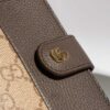 Ví ngắn gập đôi Gucci màu nâu da sần phối hoạ tiết GG Supreme MVG96 2026