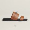 Dép quai ngang Hermes màu nâu chính hãng MGH062 2026 Dép quai ngang Hermes màu nâu chính hãng MGH062 2026