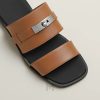Dép quai ngang Hermes màu nâu chính hãng MGH062 2026 Dép quai ngang Hermes màu nâu chính hãng MGH062 2026