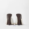 Dép cao gót Versace Sassi Patent Clogs 105mm màu trắng MDV56 2026 Dép cao gót Versace Sassi Patent Clogs 105mm màu trắng MDV56 2026