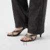 Sandals cao gót Versace Gianni Metallic Nappa màu đen MDV50 2026 Sandals cao gót Versace Gianni Metallic Nappa màu đen MDV50 2026