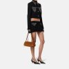 Túi xách Versace Bowling Tag màu nâu da lộn MTV044 2026 Túi xách Versace Bowling Tag màu nâu da lộn MTV044 2026