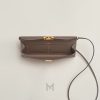 Túi đeo chéo Hermes Maillon To Go màu nâu khoá vàng MTH074 2026 Túi đeo chéo Hermes Maillon To Go màu nâu khoá vàng MTH074 2026