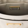 Túi xách đeo chéo Prada Bonnie màu trắng logo vàng chính hãng MHTP085 2026 Túi xách đeo chéo Prada Bonnie màu trắng logo vàng chính hãng MHTP085 2026