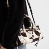 Túi xách Prada Bonnie chính hãng màu trắng phối nâu MHTP157 2026