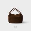 Túi xách Prada Daily chính hãng màu nâu da lộn logo vàng MHTP156 2026