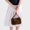 Túi xách Prada Daily chính hãng màu nâu da lộn logo vàng MHTP156 2026