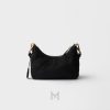 Túi đeo vai Prada Re-Edition màu đen dây xích vàng chính hãng MHTP091 2026 Túi đeo vai Prada Re-Edition màu đen dây xích vàng chính hãng MHTP091 2026