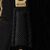 Túi đeo vai Prada Re-Edition màu đen dây xích vàng chính hãng MHTP091 2026 Túi đeo vai Prada Re-Edition màu đen dây xích vàng chính hãng MHTP091 2026