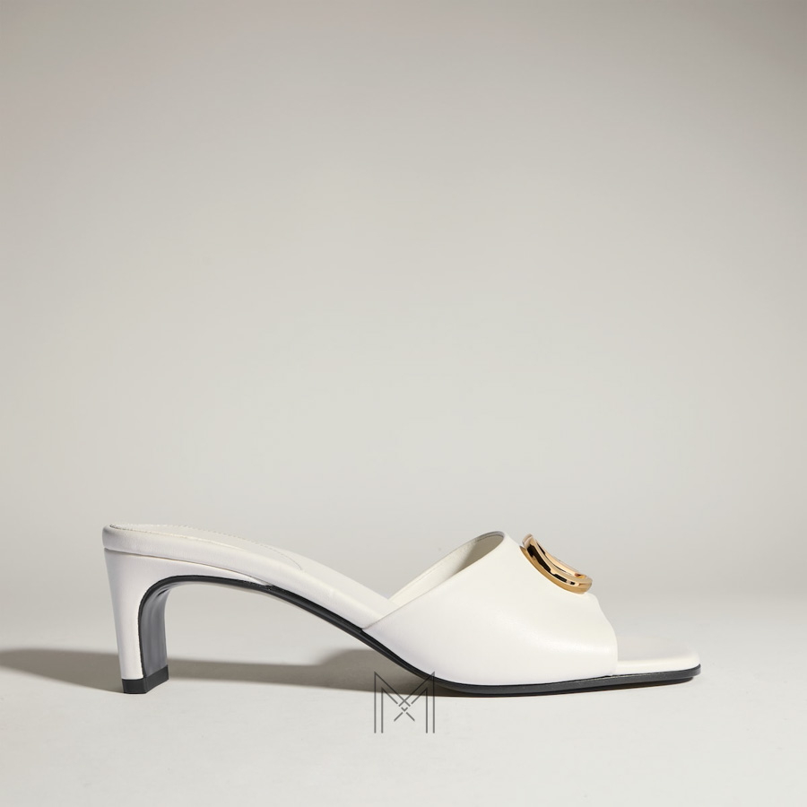 Dép Gucci cao gót màu trắng logo GG vàng chính hãng MHDG005 2026 Dép Gucci cao gót màu trắng logo GG vàng chính hãng MHDG005 2026