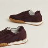 Sneaker Hermes Jet màu đỏ mận phối da lộn chính hãng MHGH031 2026 Sneaker Hermes Jet màu đỏ mận phối da lộn chính hãng MHGH031 2026