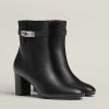 Boots cao gót Hermes authentic màu đen khoá bạc MHGH123 2026 Boots cao gót Hermes authentic màu đen khoá bạc MHGH123 2026