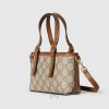 Túi xách đeo chéo Gucci Emblem họa tiết quai màu nâu chính hãng MHTG010 2026