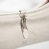 Túi kẹp nách Gucci Jackie Slim màu trắng khóa bạc chính hãng MHTG075 2026