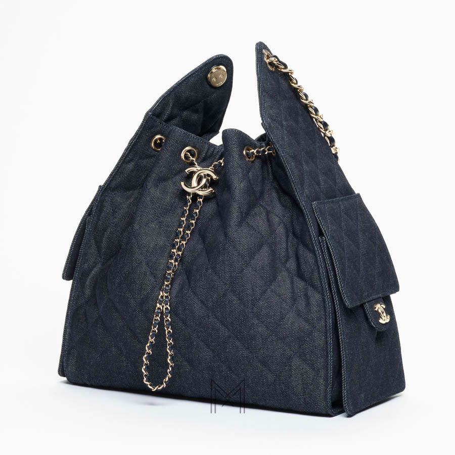 Túi dây rút Chanel Pre-Collection Xuân Hè màu xanh denim MCN36 2026 Túi dây rút Chanel Pre-Collection Xuân Hè màu xanh denim MCN36 2026