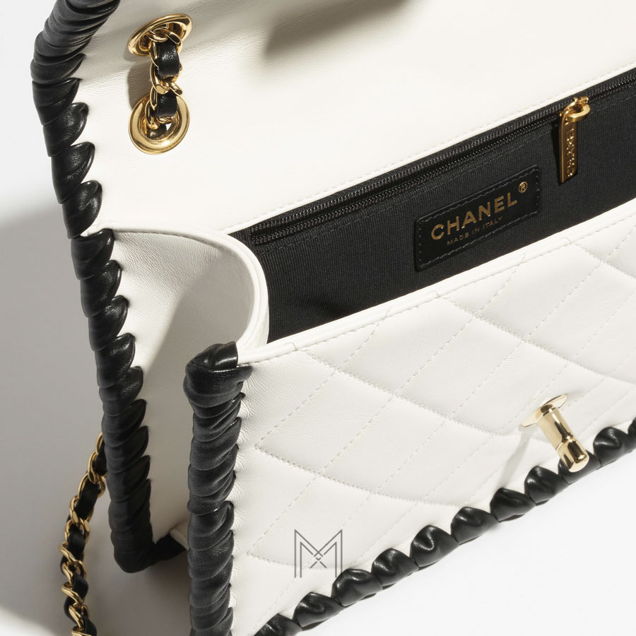 Túi Chanel nắp gập màu trắng viền đen Pre-Collection Xuân Hè MCN47 2026 Túi Chanel nắp gập màu trắng viền đen Pre-Collection Xuân Hè MCN47 2026