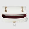 Túi xách đeo chéo Gucci Marmont màu trắng authentic MHTG107 2026
