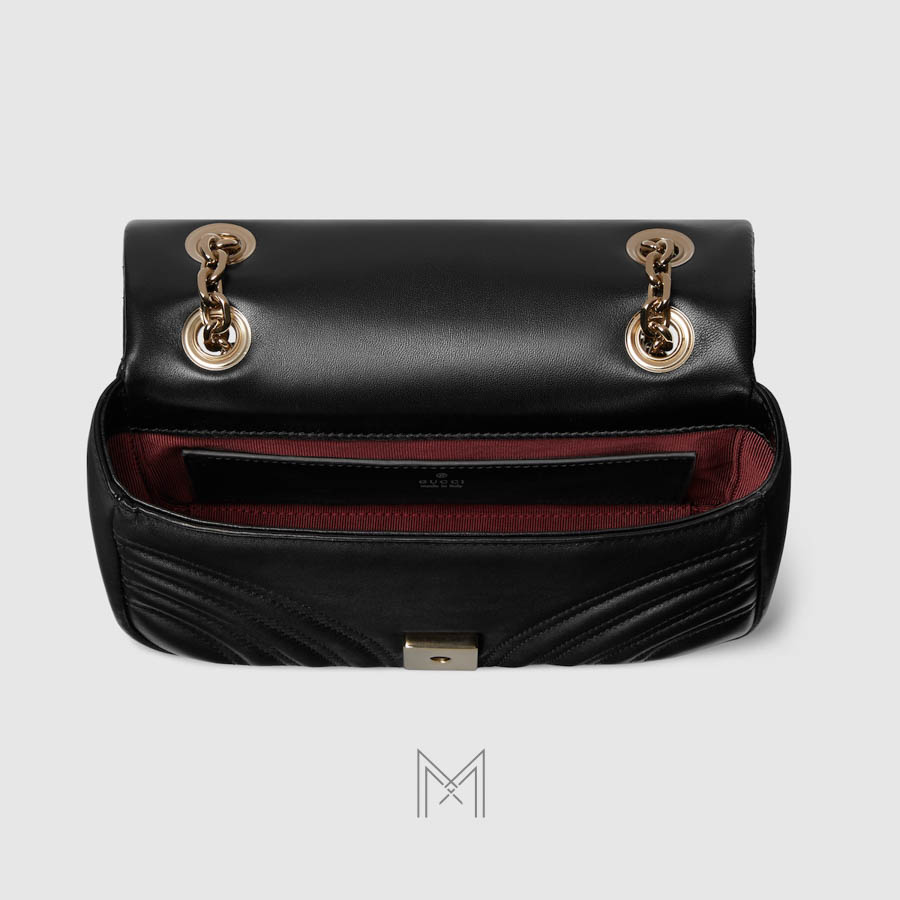 Túi xách đeo chéo Gucci Marmont màu đen dây xích vàng authentic MHTG109 2026 Túi xách đeo chéo Gucci Marmont màu đen dây xích vàng authentic MHTG109 2026