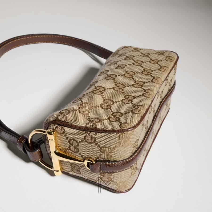 Túi xách mini Gucci Half Horsebit họa tiết monogram authentic MHTG055 2026 Túi xách mini Gucci Half Horsebit họa tiết monogram authentic MHTG055 2026