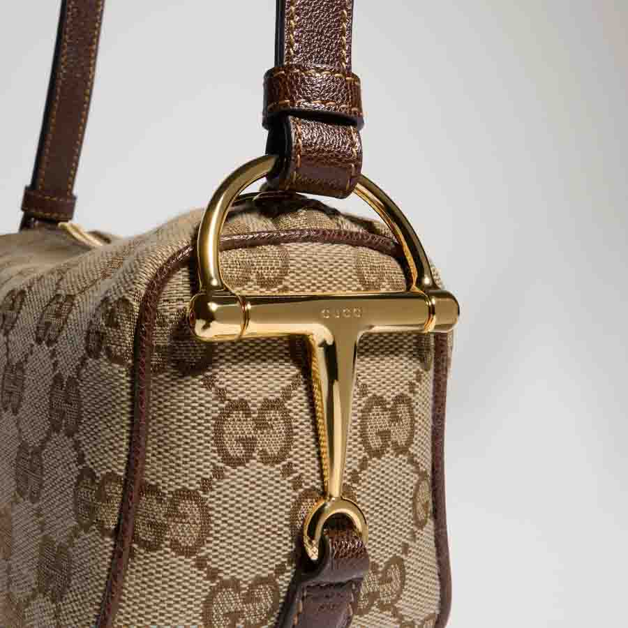 Túi xách mini Gucci Half Horsebit họa tiết monogram authentic MHTG055 2026 Túi xách mini Gucci Half Horsebit họa tiết monogram authentic MHTG055 2026