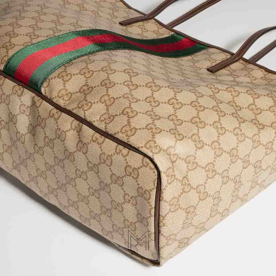 Túi xách tote Gucci Tribeca màu be họa tiết authentic MHTG180 2026 Túi xách tote Gucci Tribeca màu be họa tiết authentic MHTG180 2026
