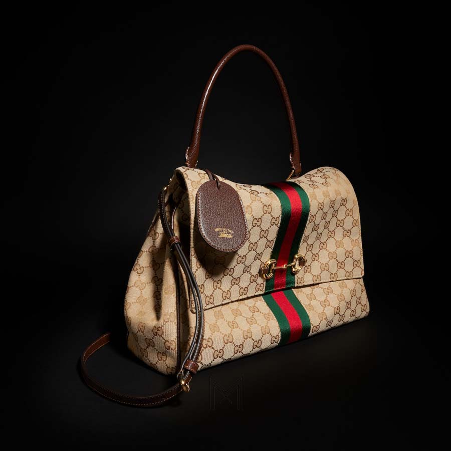 Túi xách Gucci Paparazzo họa tiết khóa vàng chính hãng MHTG146 2026 Túi xách Gucci Paparazzo họa tiết khóa vàng chính hãng MHTG146 2026