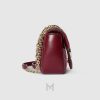 Túi Gucci Marmont xách đeo chéo màu đỏ logo GG vàng chính hãng MHTG119 2026