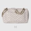 Túi Gucci Marmont xách đeo chéo màu xám nhạt logo GG vàng chính hãng MHTG121 2026