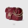 Túi Gucci Marmont xách đeo chéo màu đỏ logo GG vàng chính hãng MHTG119 2026