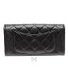 Ví dài Chanel màu đen da sần logo CC màu vàng MHV32 2026