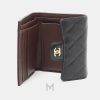 Ví gập ba Chanel màu đen da sần chính hãng MHV24 2026