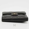 Ví gập ba Chanel màu đen da sần chính hãng MHV24 2026